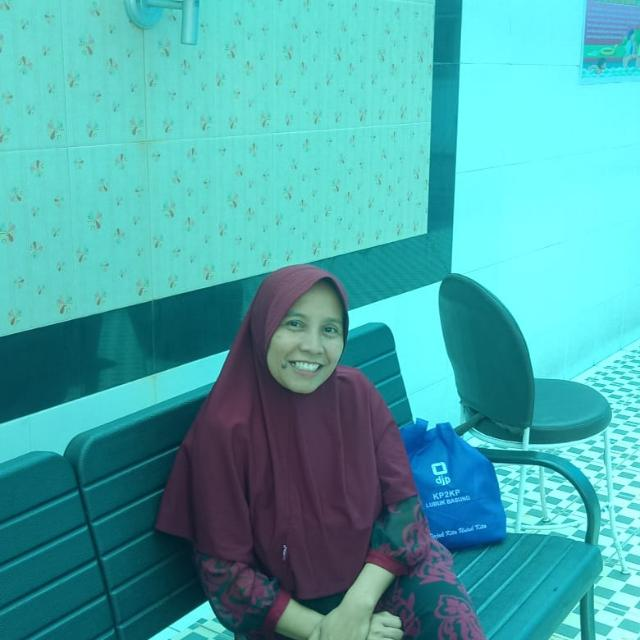 <center>Wakil Bidang Kurikulum<br>Milva Hetti,S.PD.M.Si</center>